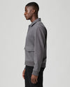 grey mens jacket with collar, 2 flap pockets and concealed placket from paige side view