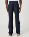 Navy blue pants with a white drawstring by Paige worn by a man on a light gray background rear view
