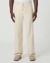 Beige paige pants worn by a man on a white background