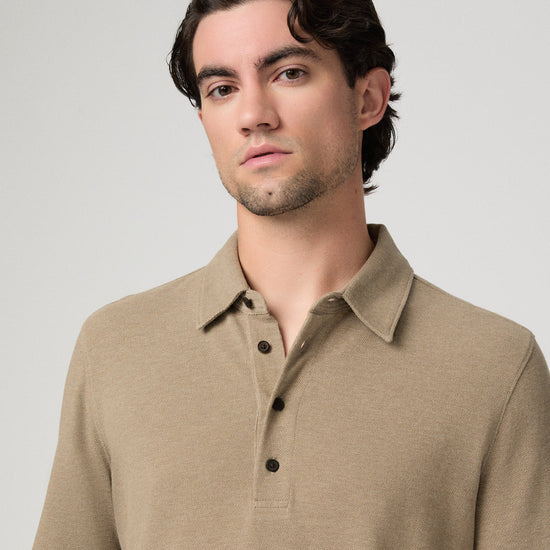 Man wearing beige polo close up