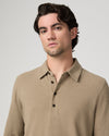 Man wearing beige polo close up