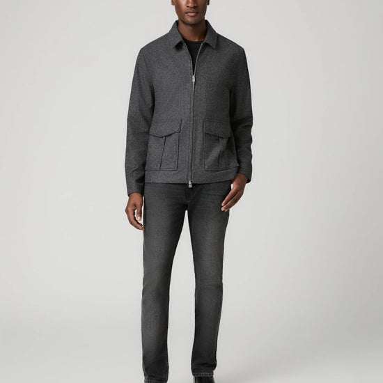 Man wearing grey zip jacket and black jeans  full outfit 