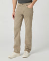 Person wearing beige pants on a plain background from paige