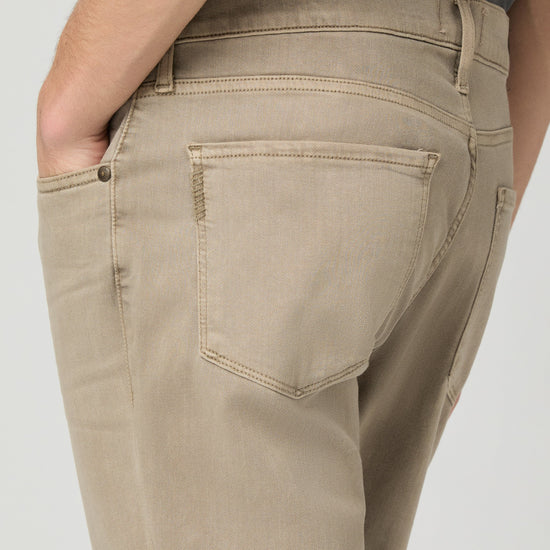 Beige pants with a plain background