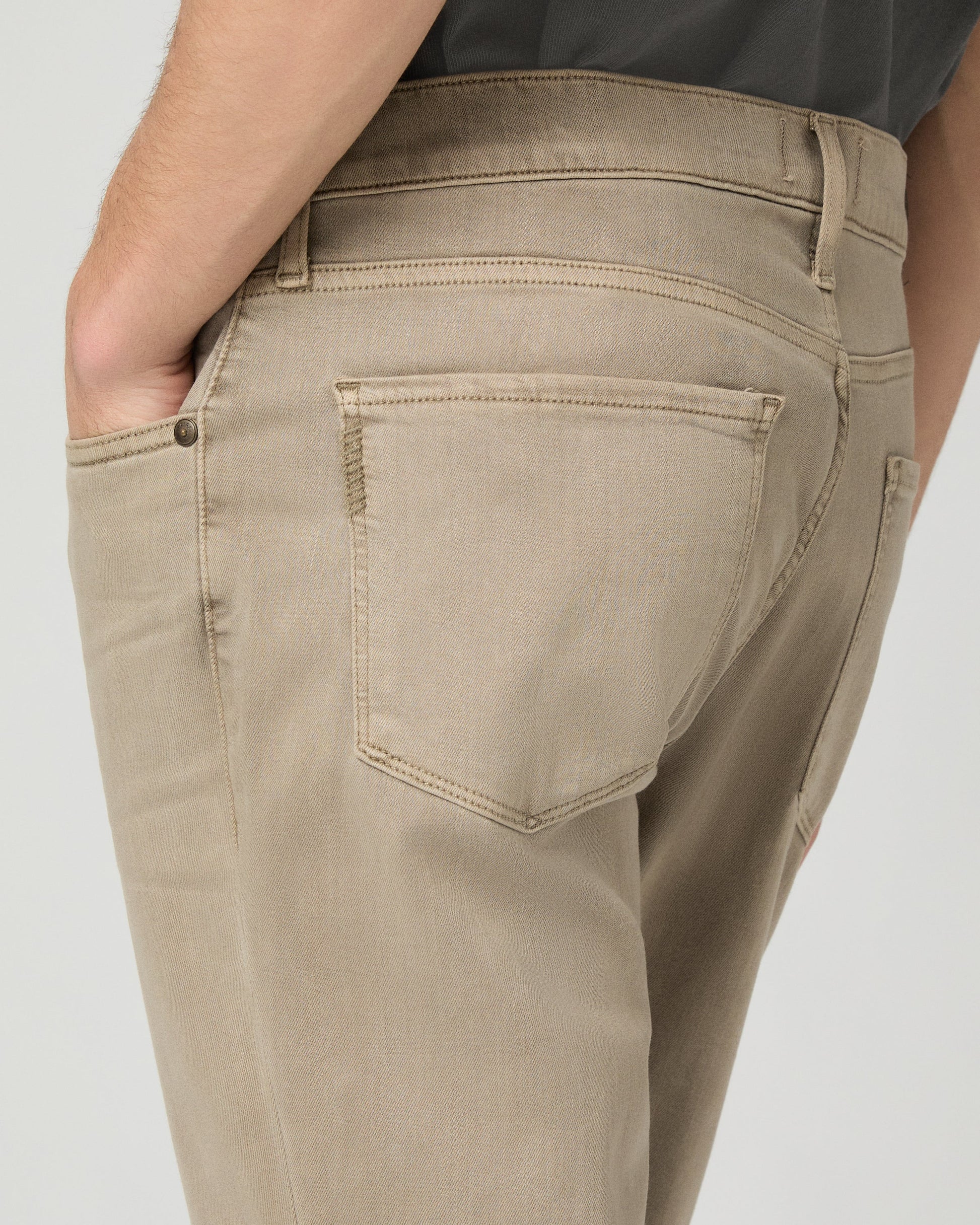Beige pants with a plain background