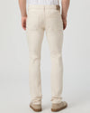 Person wearing beige pants on a plain background from Paige