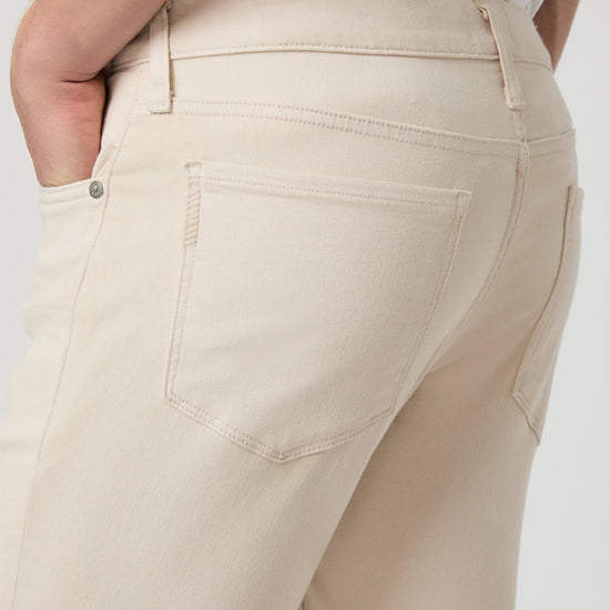 Beige pants with a white background from Paige