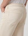Beige pants with a white background from Paige