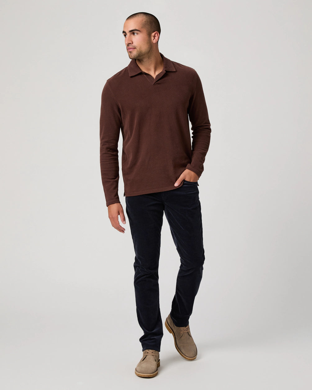 navy blue micro corduroy slim straight leg jeans with metallic hardware from paige model shot