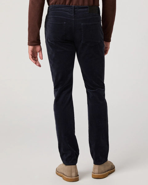 navy blue micro corduroy slim straight leg jeans with metallic hardware from paige rear view