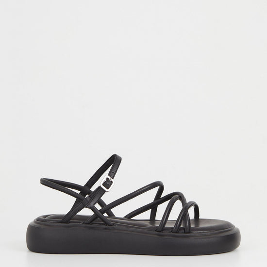 Black strappy chunky sole leather sandals