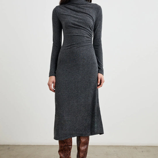 dark grey body con dress with ruching details and long sleeves