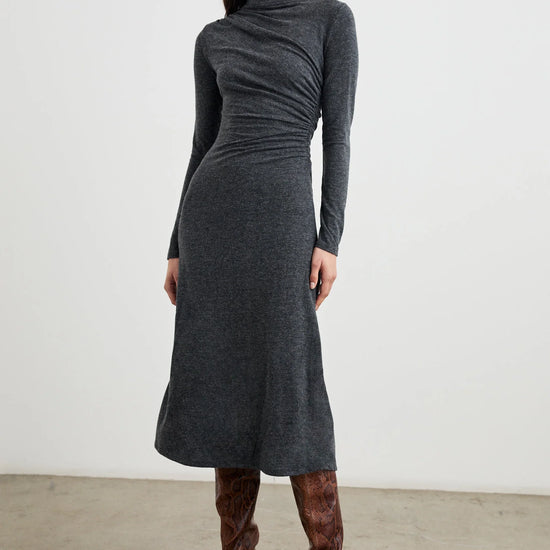 dark grey body con dress with ruching details and long sleeves model shot