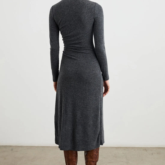 dark grey body con dress with ruching details and long sleeves rear view