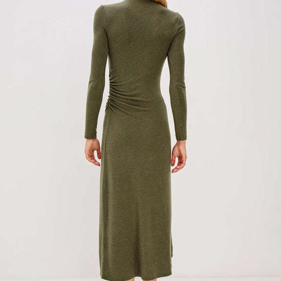 olive green bodycon dress with rouche detailing and mid length with long sleeves rear view