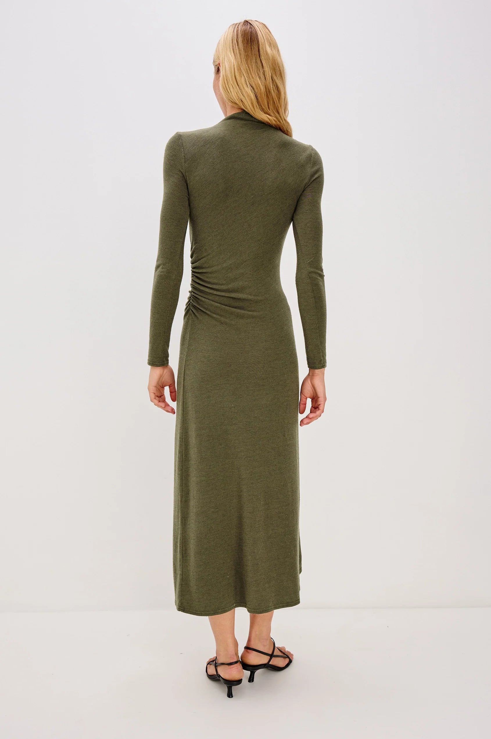 olive green bodycon dress with rouche detailing and mid length with long sleeves rear view
