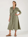 Woman wearing a green dress by Mondo Corsini with a white background