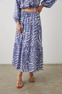 Midi skirt with white and cornflower blue geometric pattern fully lined with triple tiers