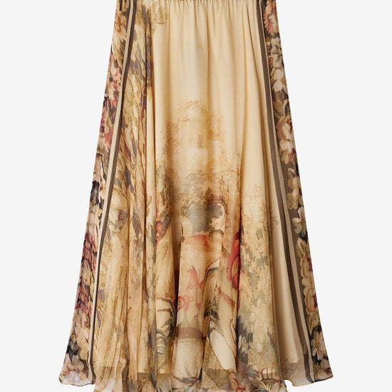 Long floral-patterned skirt on a white background