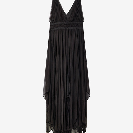 Black dress with sheer details on a white background