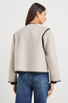 oatmeal collarless jacket with black piping and 2 front patch pockets  rear view 