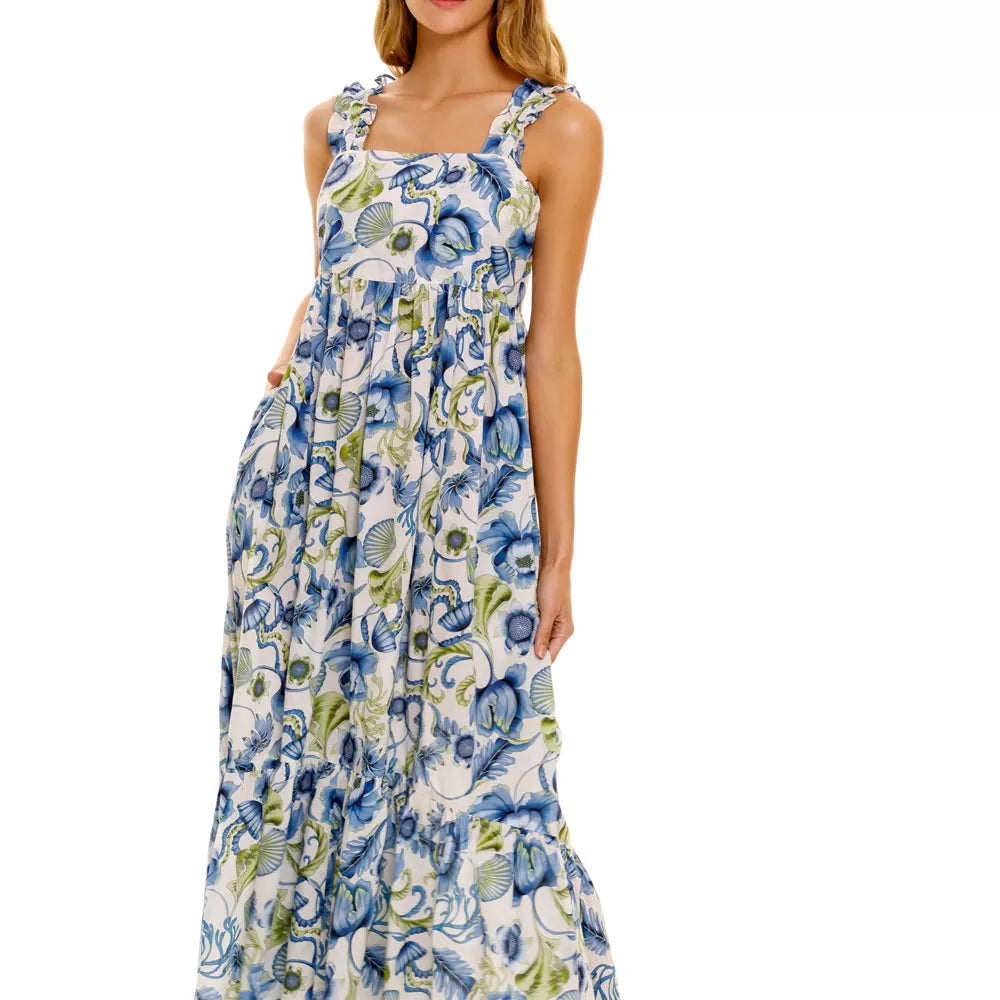 maxi floral dress with ecru base and blue and green pattern with ruffle straps tie back and deep frill 