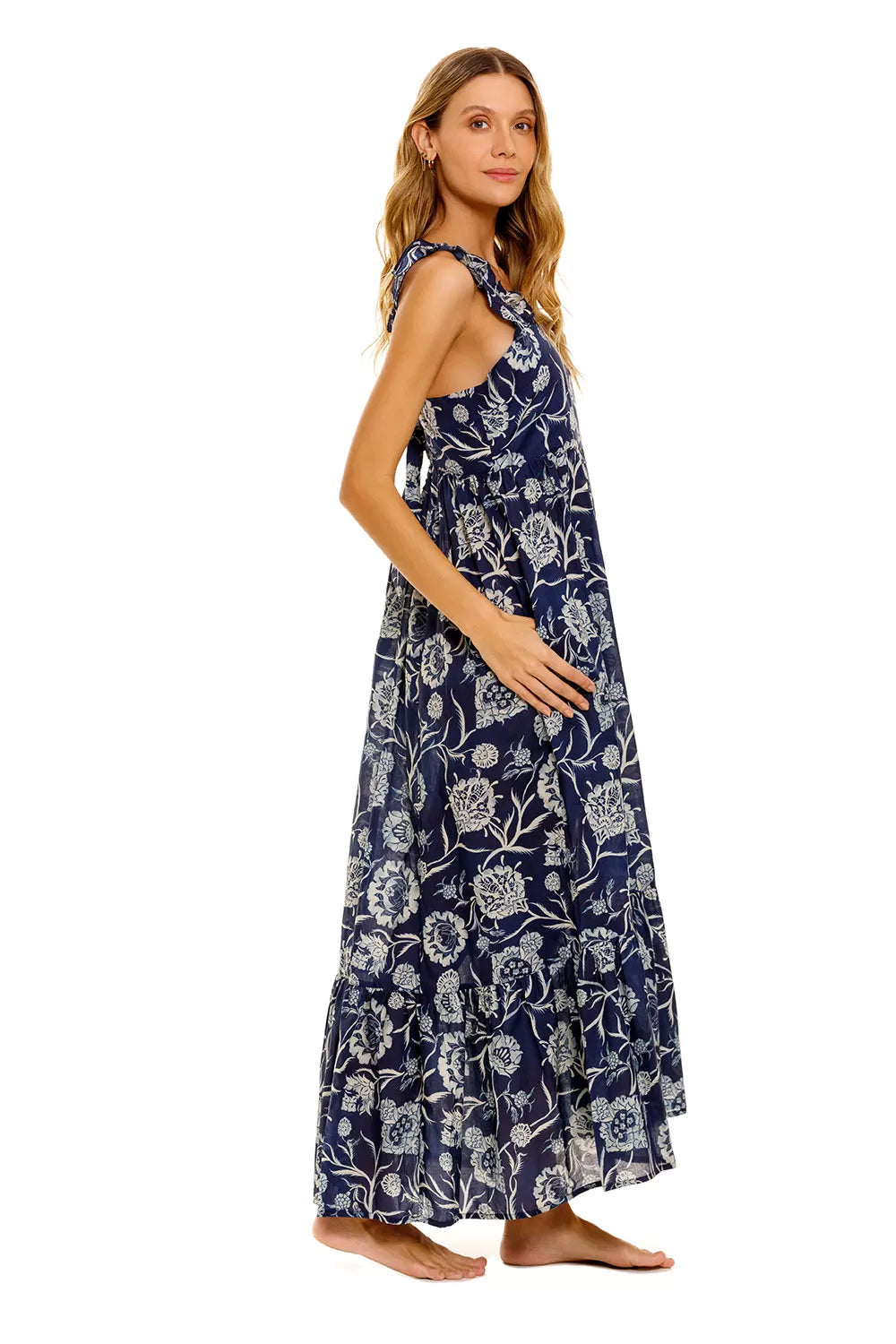 Maxi navy dress with all over floral print ruffle straps square neckline and tie back with elasticated backline and deep ruffle hem