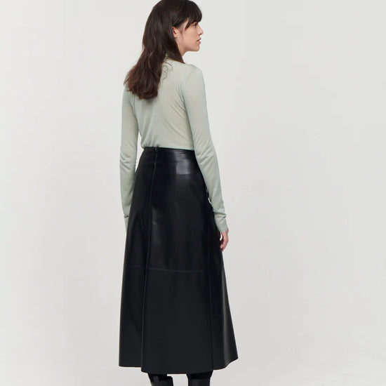 A line midi vegan leather black skirt with panel features and a centre back zip fastening with inseam side pockets