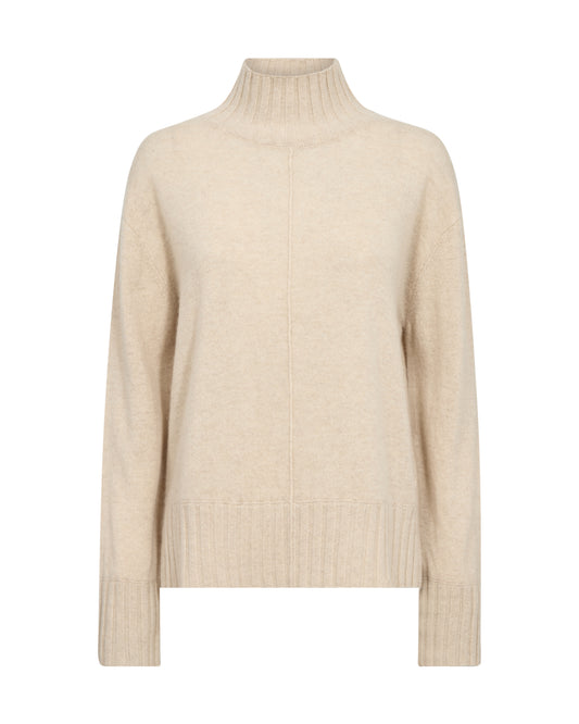 A light beige knit turtleneck sweater with long sleeves and ribbed cuffs and hem, shown on a plain white background.