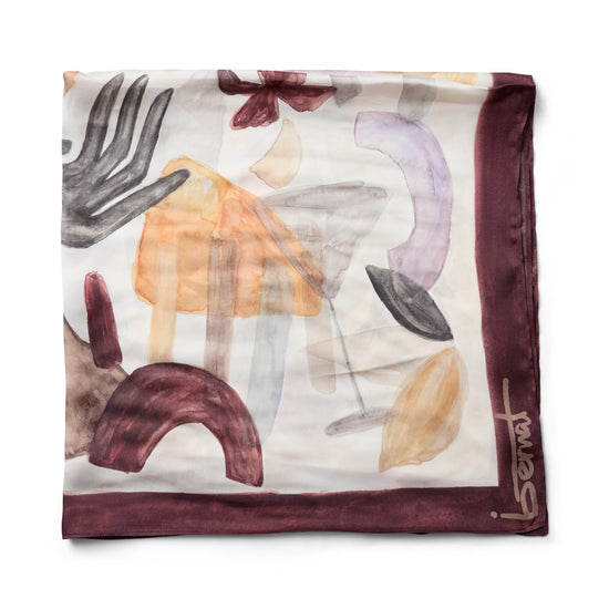 Scarf folded up on a white backround