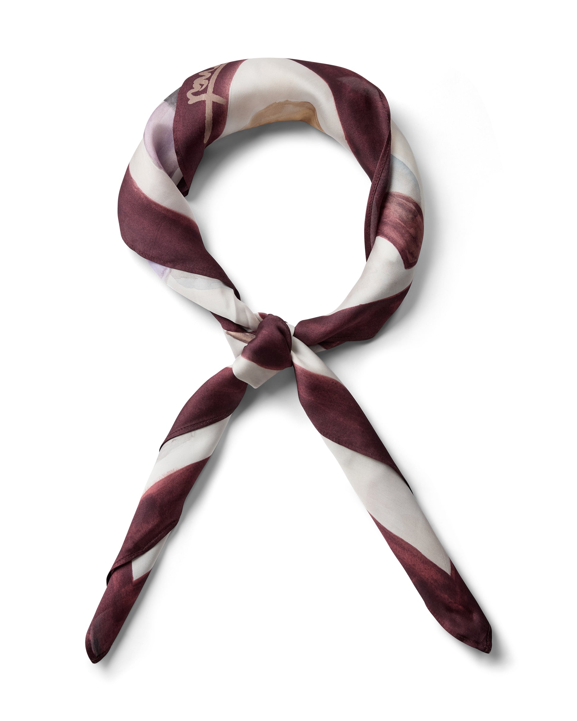 Scarf twisted into a knot on a white background