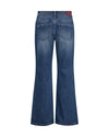 Back view of a pair of blue denim flare jeans on a white background.
