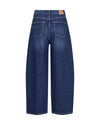 Back view of dark blue wide-leg denim jeans with a tan leather patch at the waistband, shown on a plain white background.