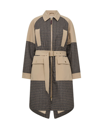 A colour-blocked mid-length coat featuring a beige collar, waist tie belt, and large front flap pockets, combined with black and beige checkered panels on the body and sleeves, shown against a plain white background.