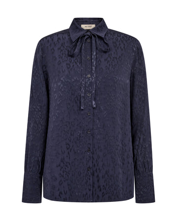 A dark navy blue long-sleeve button-up shirt with a subtle tonal leopard print and a tie-neck collar, shown against a plain white background.