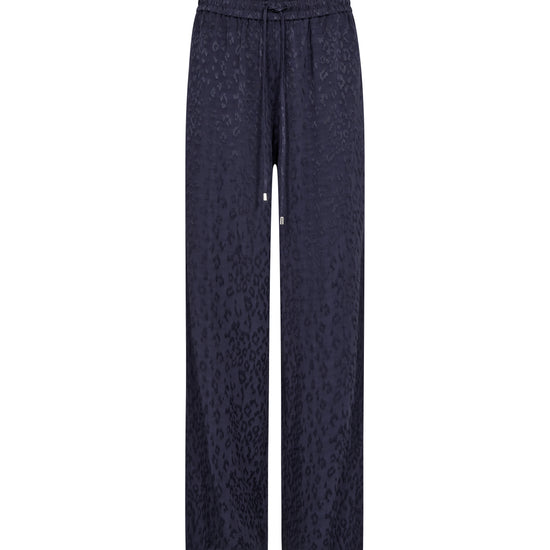 Dark navy wide-leg trousers with a subtle leopard print pattern, featuring an elastic waistband and drawstring.