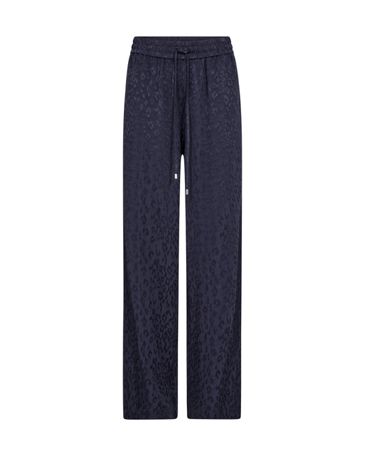 Dark navy wide-leg trousers with a subtle leopard print pattern, featuring an elastic waistband and drawstring.