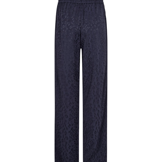 A pair of dark navy wide-leg trousers with a subtle textured jacquard pattern, shown flat against a solid white background.