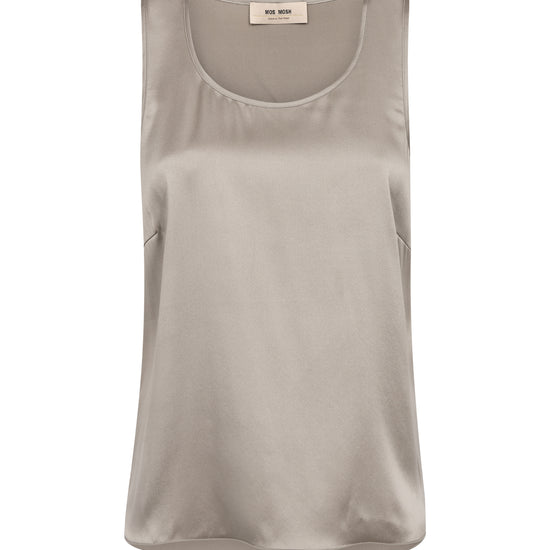 A sleeveless scoop-neck tank top in a light taupe-beige color, displayed flat against a solid white background. The brand label at the inner collar 