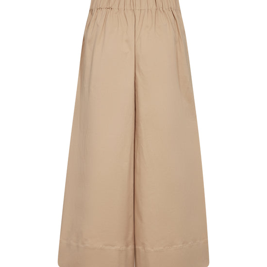 Beige wide-leg pants on a white background