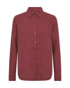 Flat lay of a red linen shirt on a white background
