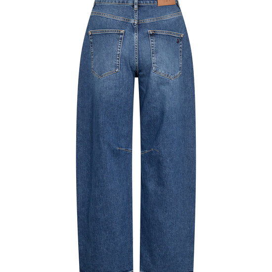Back view of a pair of medium-wash blue denim jeans with a straight-leg or wide-leg cut, featuring classic five-pocket styling and a tan leather patch at the back waistband, shown on a plain white background.