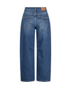 Back view of a pair of medium-wash blue denim jeans with a straight-leg or wide-leg cut, featuring classic five-pocket styling and a tan leather patch at the back waistband, shown on a plain white background.