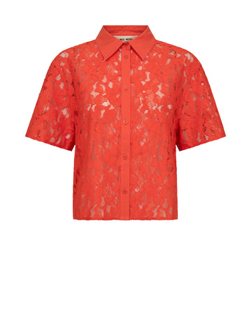 Orange lace floral patterned shirt on a white background