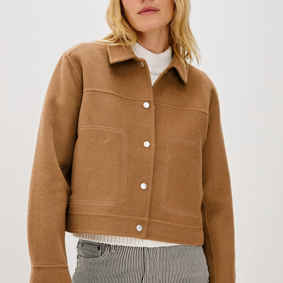 camel short jacket with collar, white stitch detailing and boxy fit