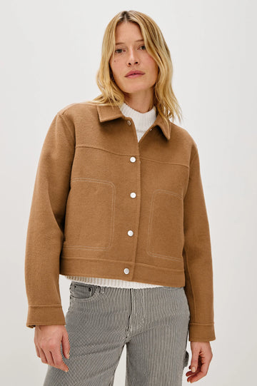 camel short jacket with collar, white stitch detailing and boxy fit