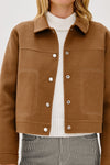camel short jacket with collar, white stitch detailing and boxy fit close up