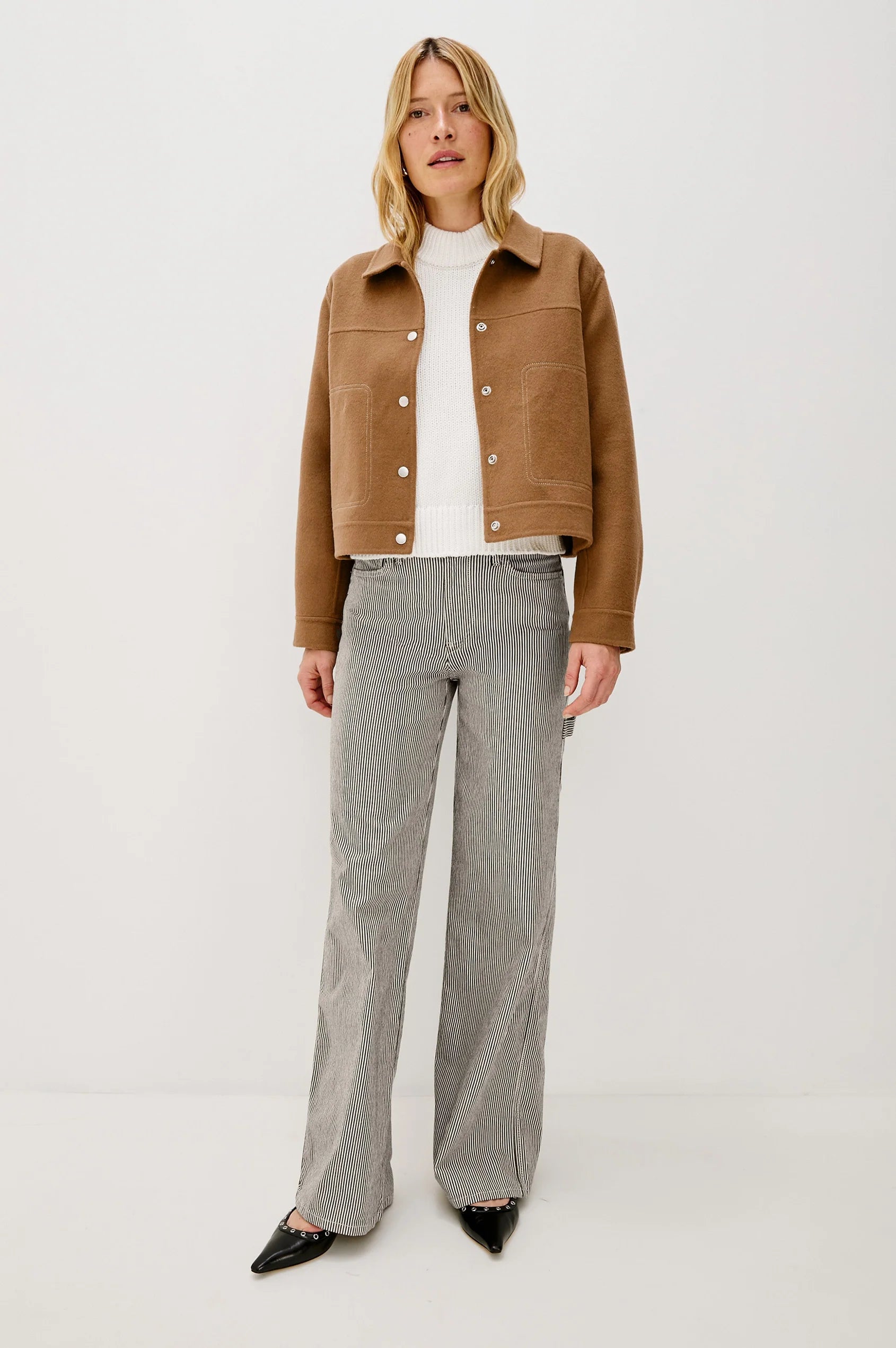 camel short jacket with collar, white stitch detailing and boxy fit model shot