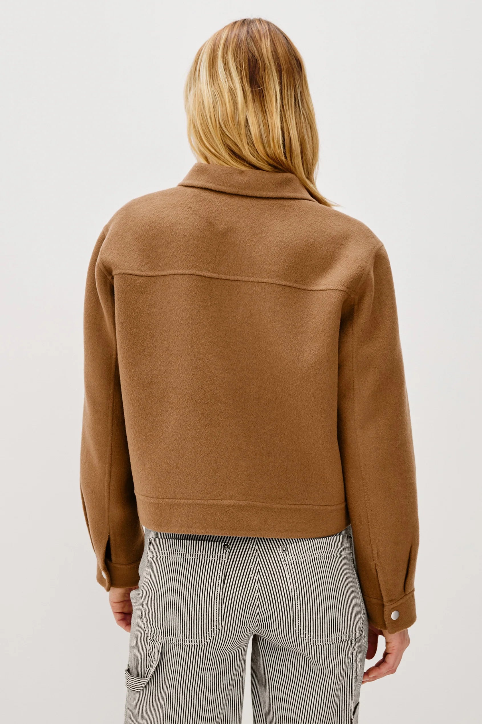 camel short jacket with collar, white stitch detailing and boxy fit rear view