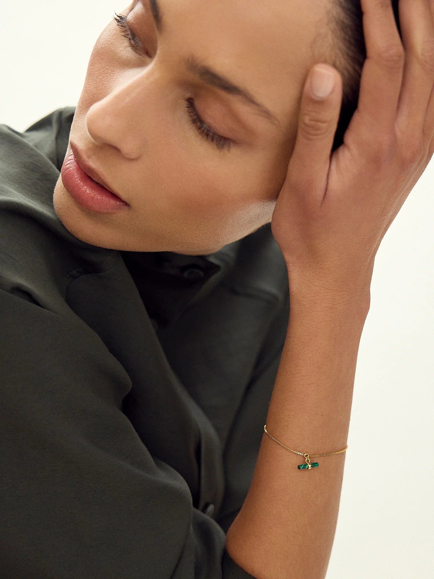 delicate gold bracelet with green malachite t bar charm with lobster clasp from rachel jackson model shot